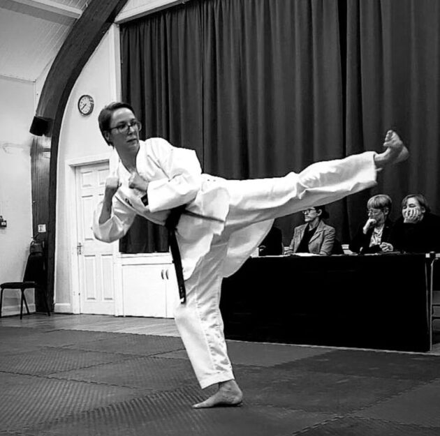 Gemma Mann doing a taekwondo kick